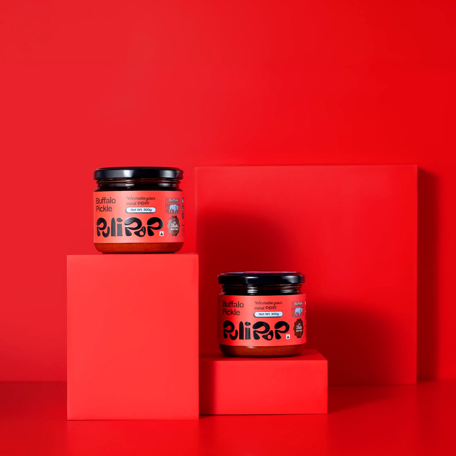 Two jars of Buffalo Beef Pickle by PuliPOP on red pedestals
