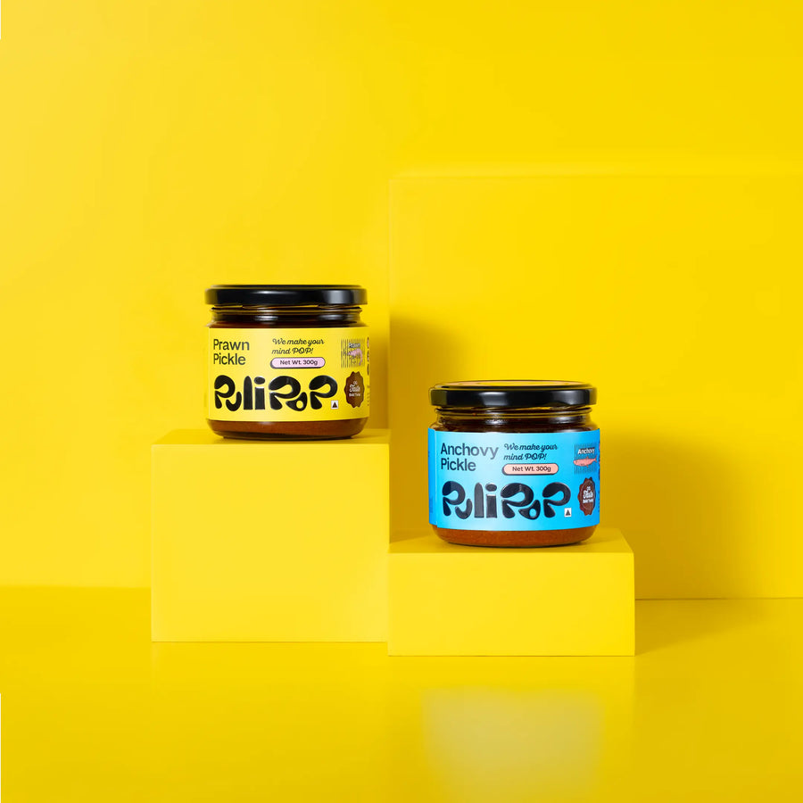 The Sea POP bundle by PuliPOP showing Prawn Pickle and Anchovy Pickle jars on yellow pedestals